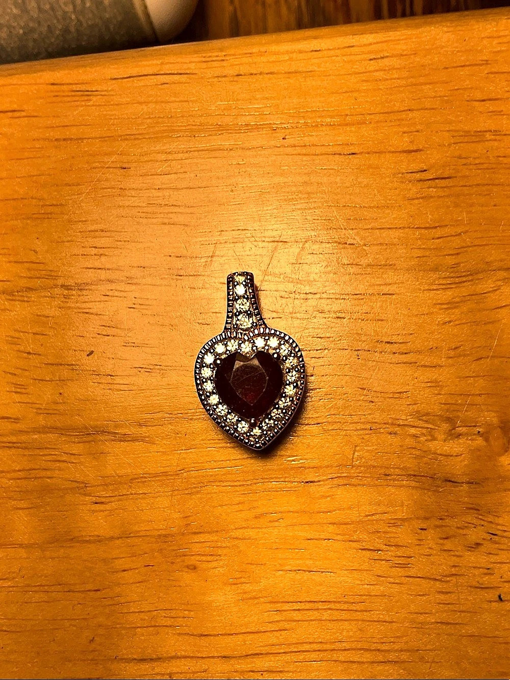 3.3 grams silver, ruby and cz pendant
